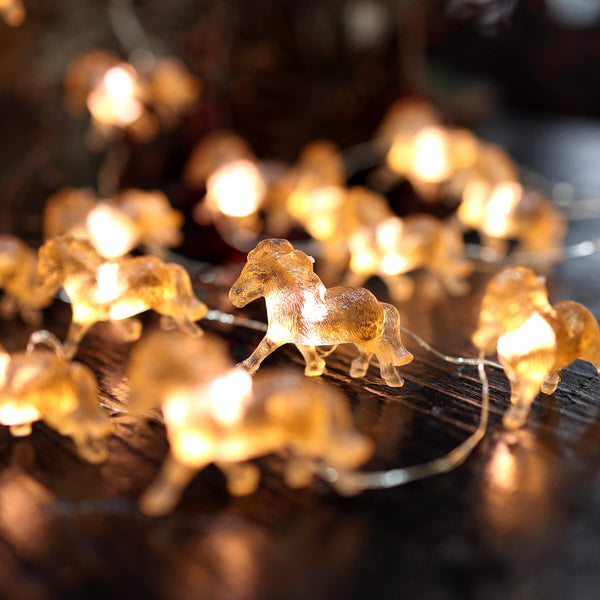 Horse fairy lights styled for girls bedroom shelves