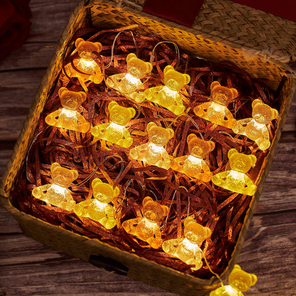 3D teddy bear string lights glowing on cozy shelf display