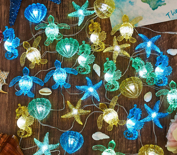 Sea life solar string lights glowing for coastal patio decor